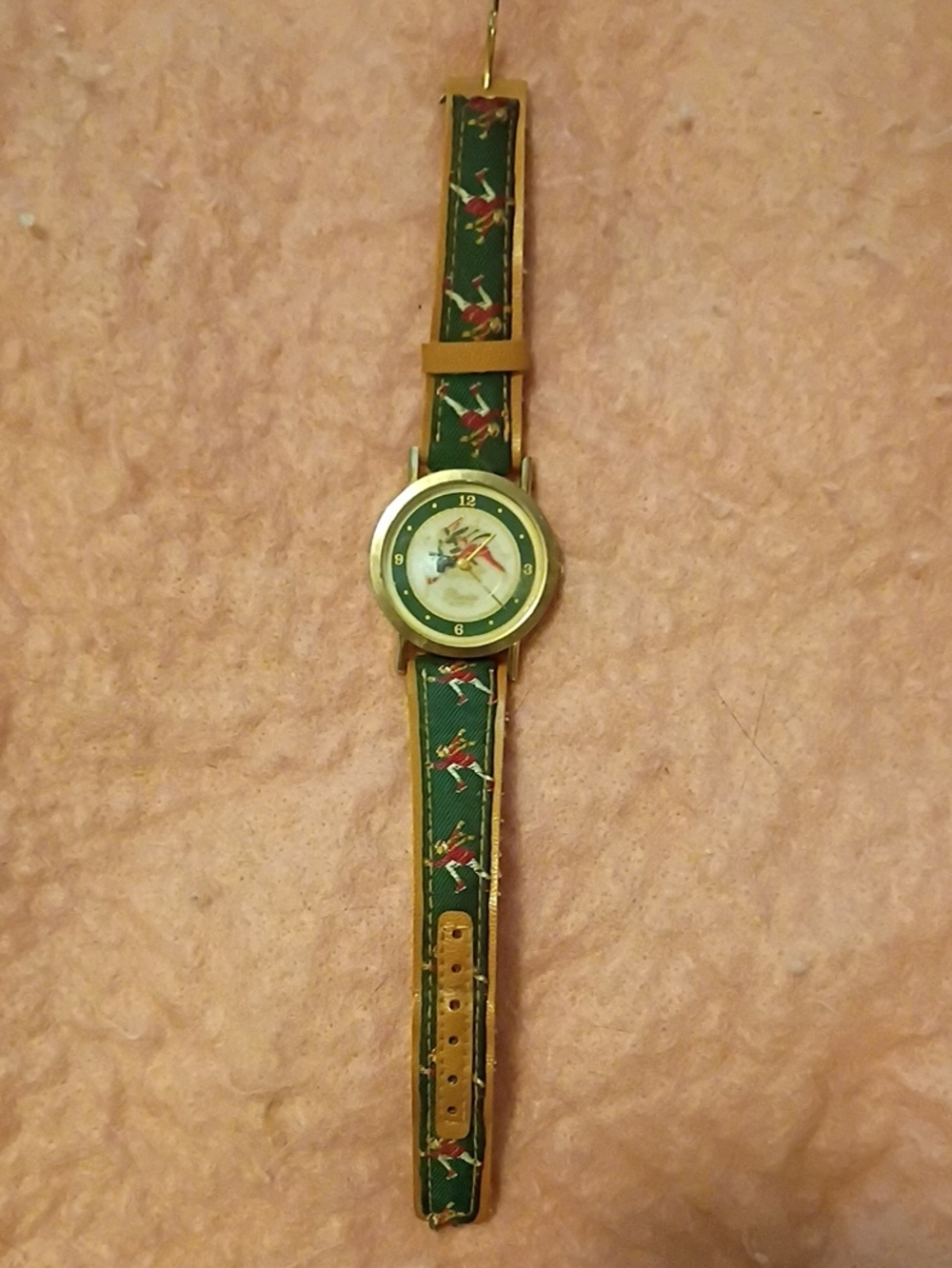 Green Watch With Ice Skaters